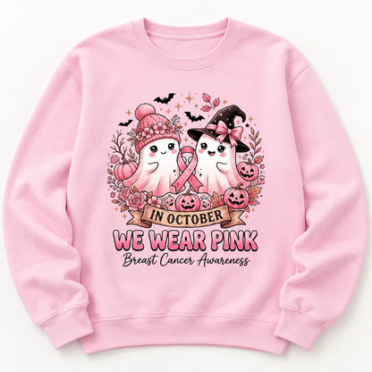 Pink ribbon ghost duo on a light pink crewneck sweatshirt